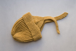 we also do a pom pom version of this bonnet, a picture of which you can see in our blog post  