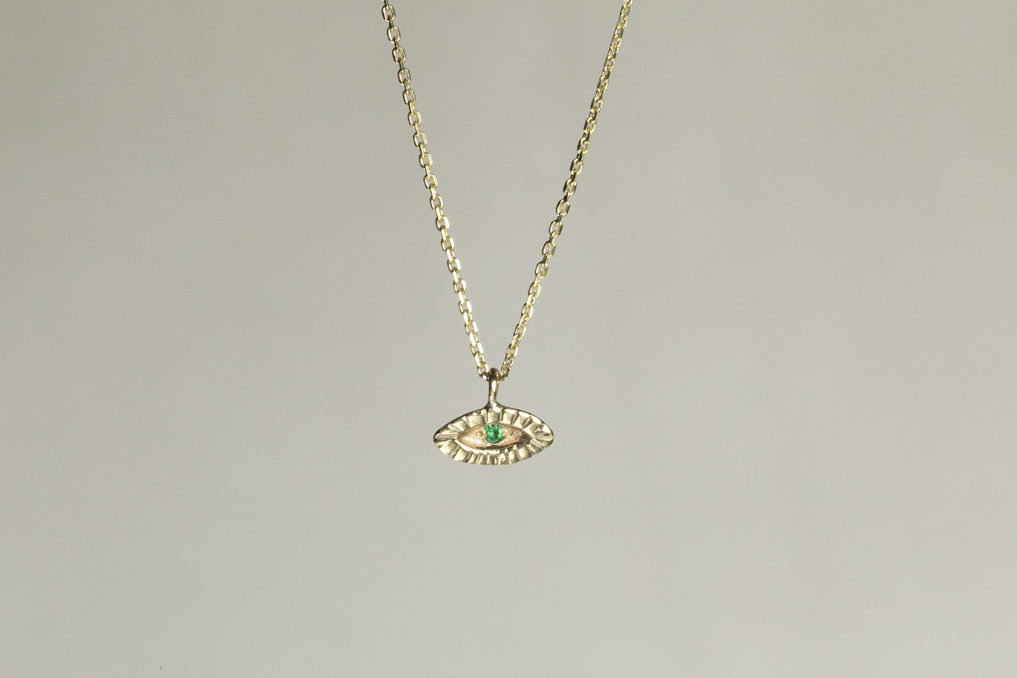 Momocreatura Tiny Eye Necklace with Emerald