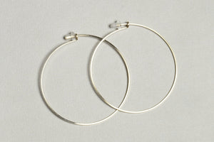 a slightly smaller version of gold filled hoops by boe