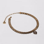 Vintage Dior Heart Choker Necklace in Aged Gold.