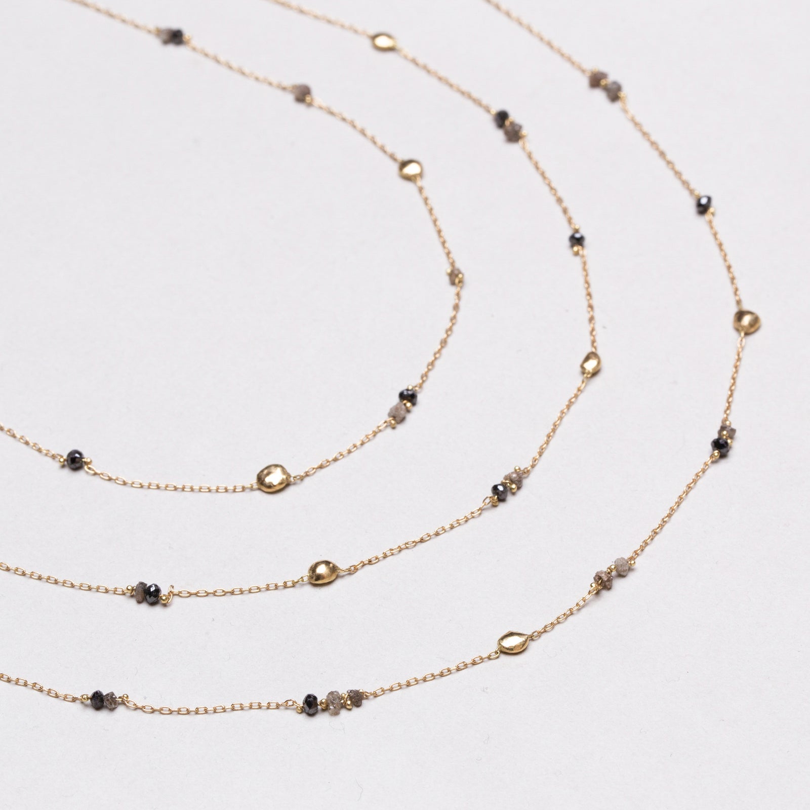 Vintage Triple-Strand Gold Necklace with Beads