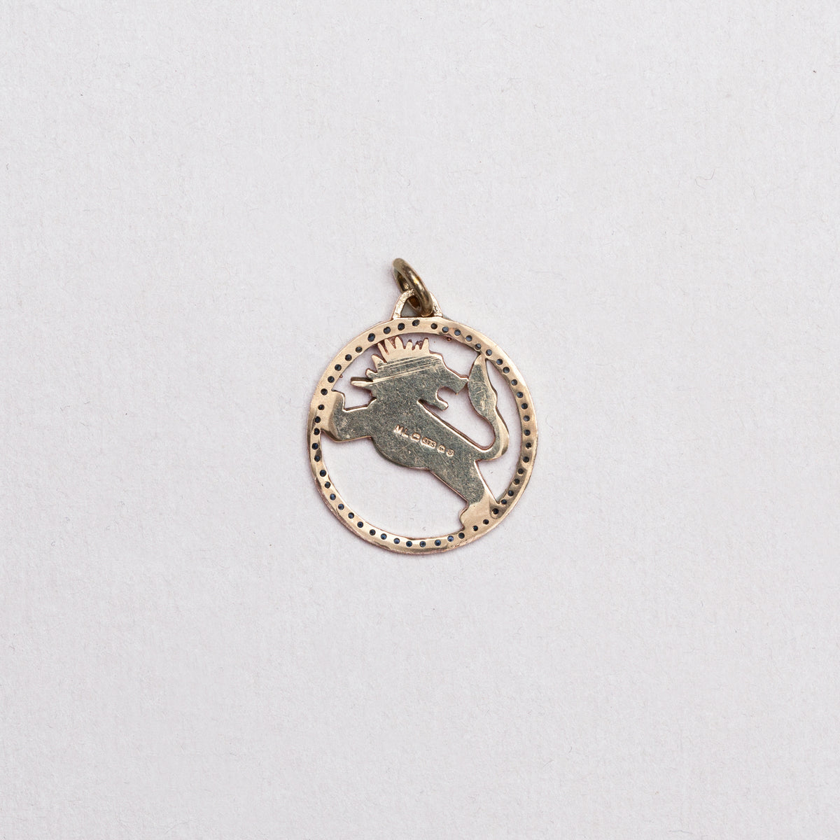 Vintage 9ct Gold Leo Pendant Charm with Sapphires