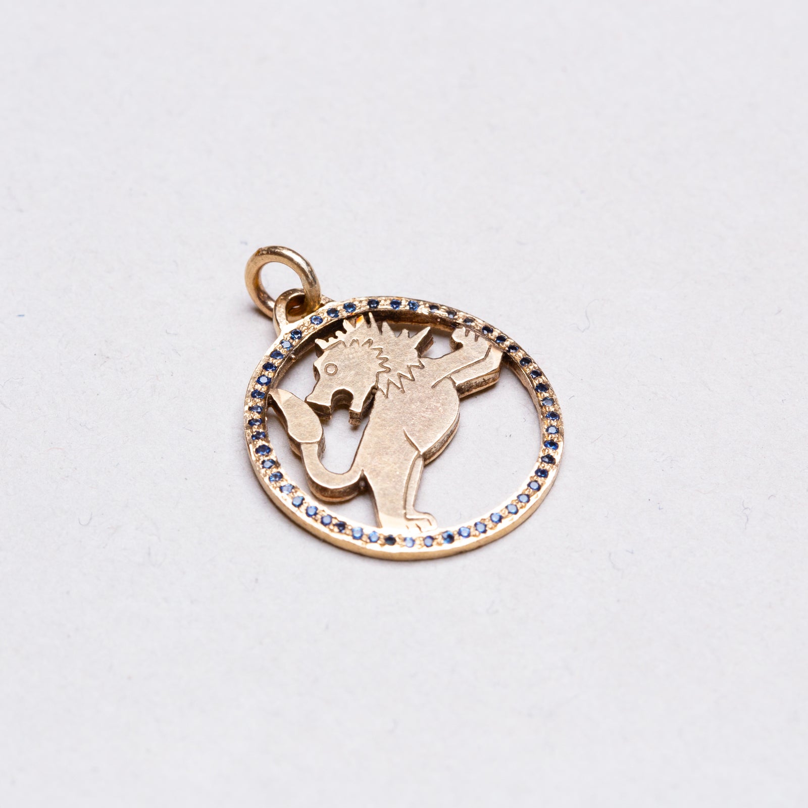 Vintage 9ct Gold Leo Pendant Charm with Sapphires