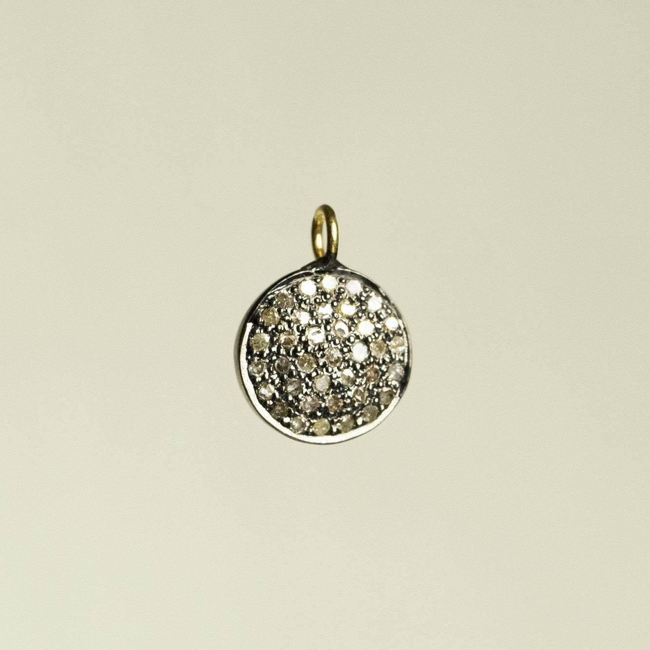 bright but not really diamond disc set in oxidised silver - for fans of the understated