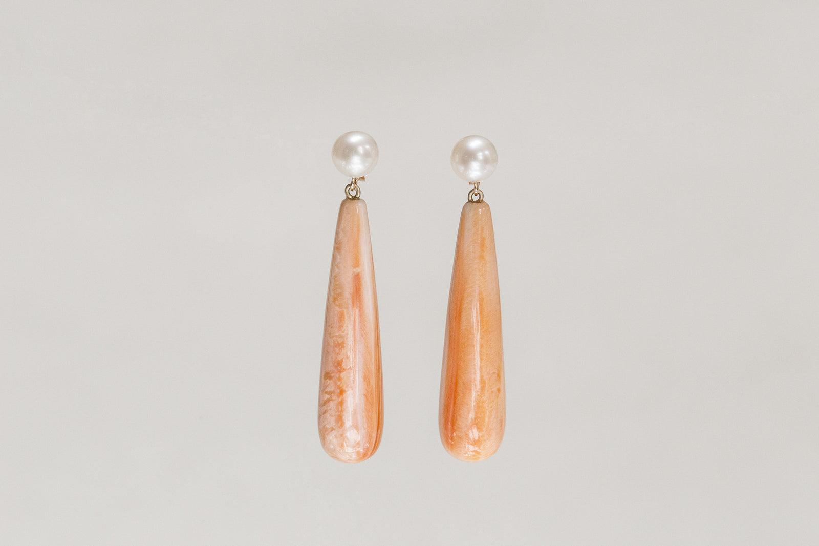 Claire van Holthe orange shell long drop, freshwater pearl and 9 carat gold modern drop earrings