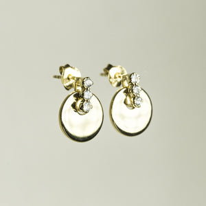 side view of Davina Combes Disc with Stones Drop Earrings