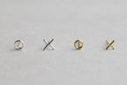 "Hugs and Kisses" are hand made which gives them an alluring imperfect form