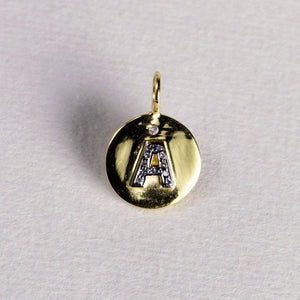 made of 18 carat gold disc with polished finish these initials are as adorable as they can be!