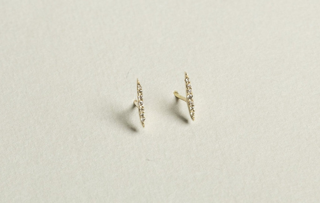  incredible sunbeam earrings set with sparkly diamonds - they have a subtle oblong shape and are a superb alternative to other 'stick' earrings