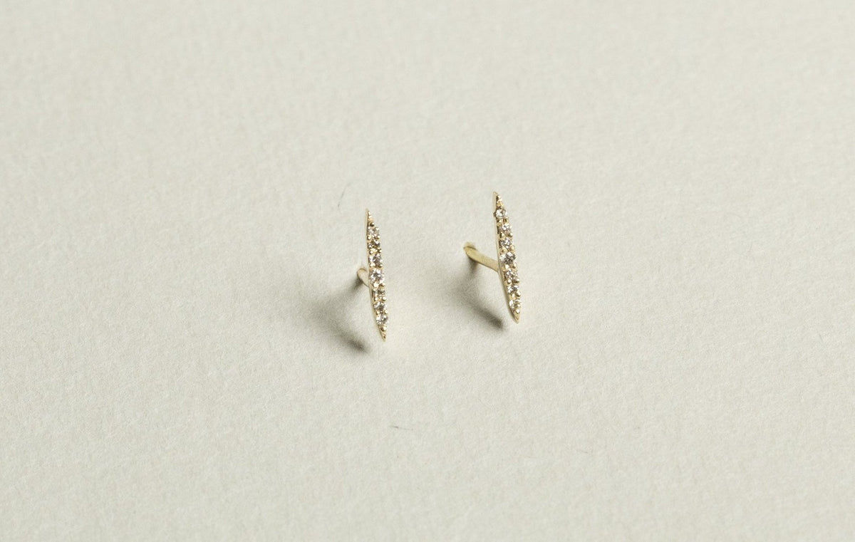  incredible sunbeam earrings set with sparkly diamonds - they have a subtle oblong shape and are a superb alternative to other 'stick' earrings