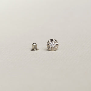 eclectic, vintage inspired starburst earring in white gold